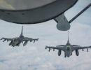 F-16 pilots, KC-135 crews team for mid-air refueling training F-16 pilots, KC-135 crews team for mid-air refueling training