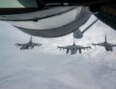 F-16 pilots, KC-135 crews team for mid-air refueling training F-16 pilots, KC-135 crews team for mid-air refueling training