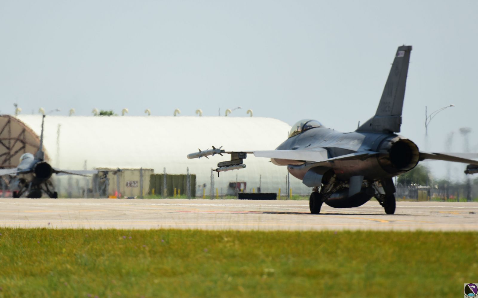 F-16 Fighting Falcon taxi down the flightline F-16 Fighting Falcon taxi down the flightline